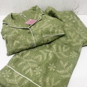 Sage green printed Turkish linen blend pajama set folded on a white surface
