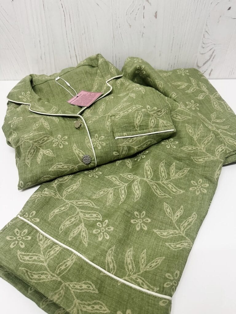 Sage green printed Turkish linen blend pajama set folded on a white surface