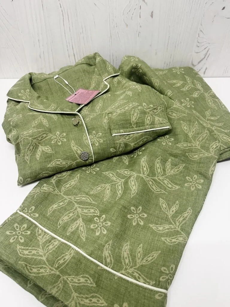 Sage green printed Turkish linen blend pajama set folded on a white surface